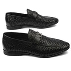 Black woven loafers with a silver buckle on a white background